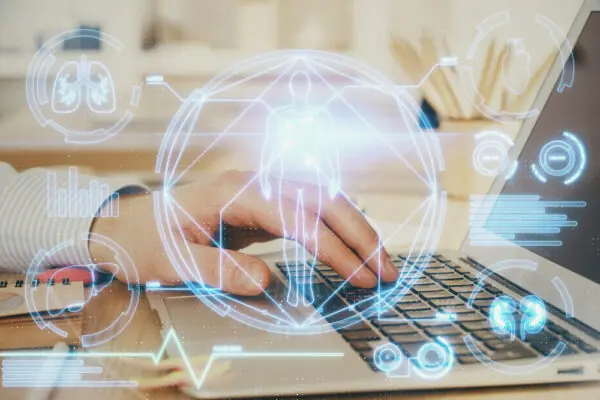 Science hologram with man working on computer on background. Concept of study. Double exposure.