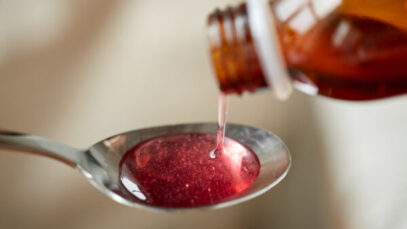 medication or antipyretic syrup and spoon acebrofilina